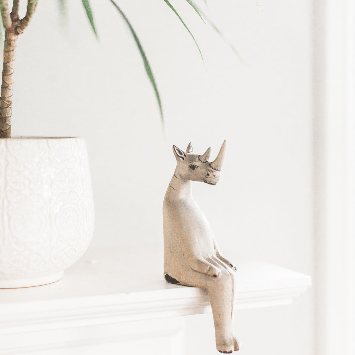 Hand-carved Rhino Shelf Sitter