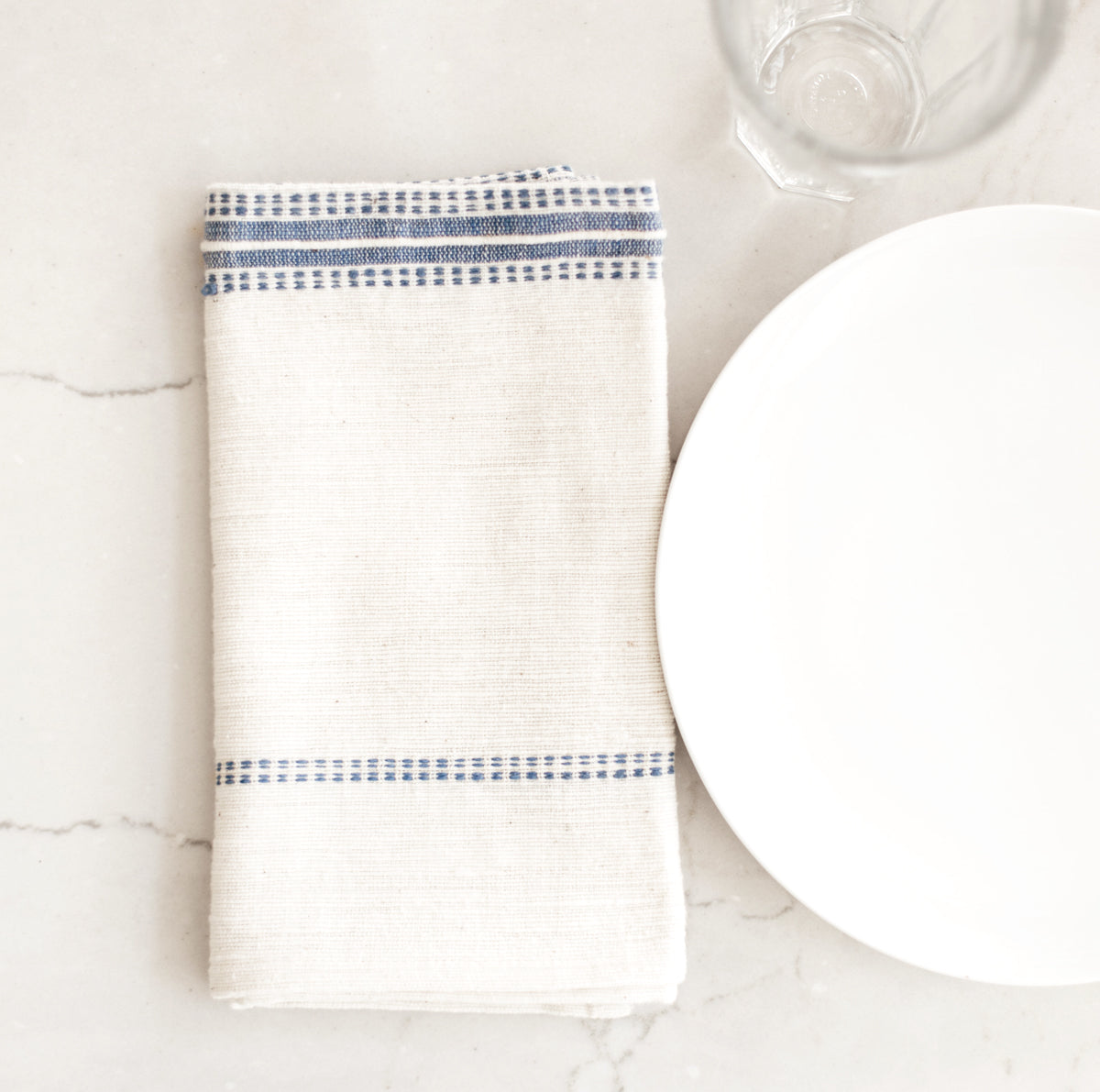 striped white and blue cotton dinner napkin