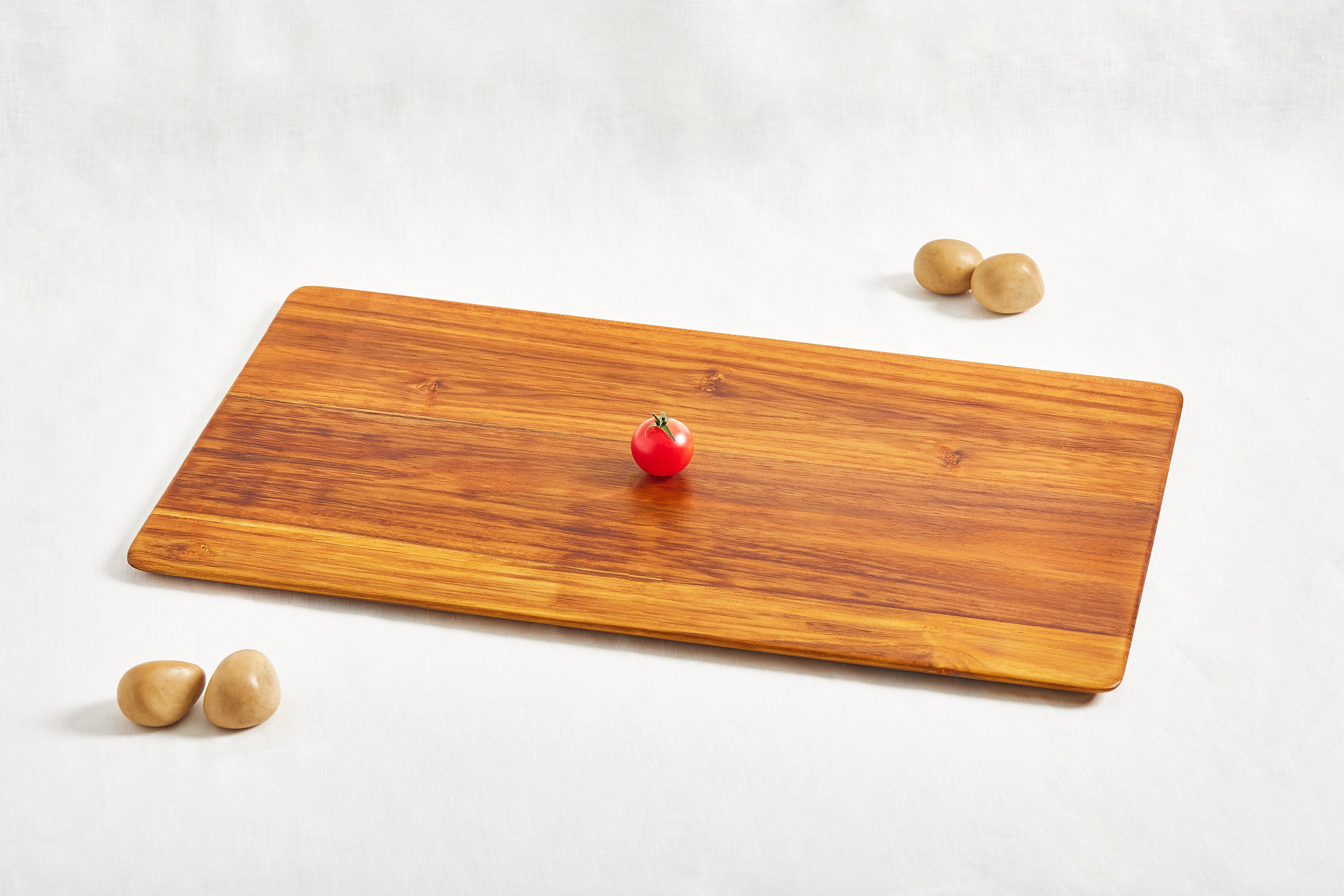 large lightweight handcarved teak cutting board