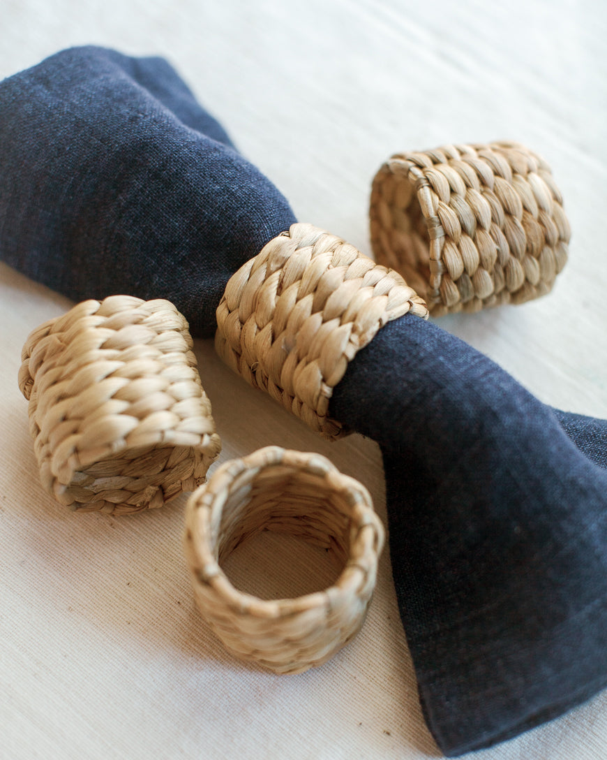 water hyacinth napkin ring set of 4 with navy blue linen napkin