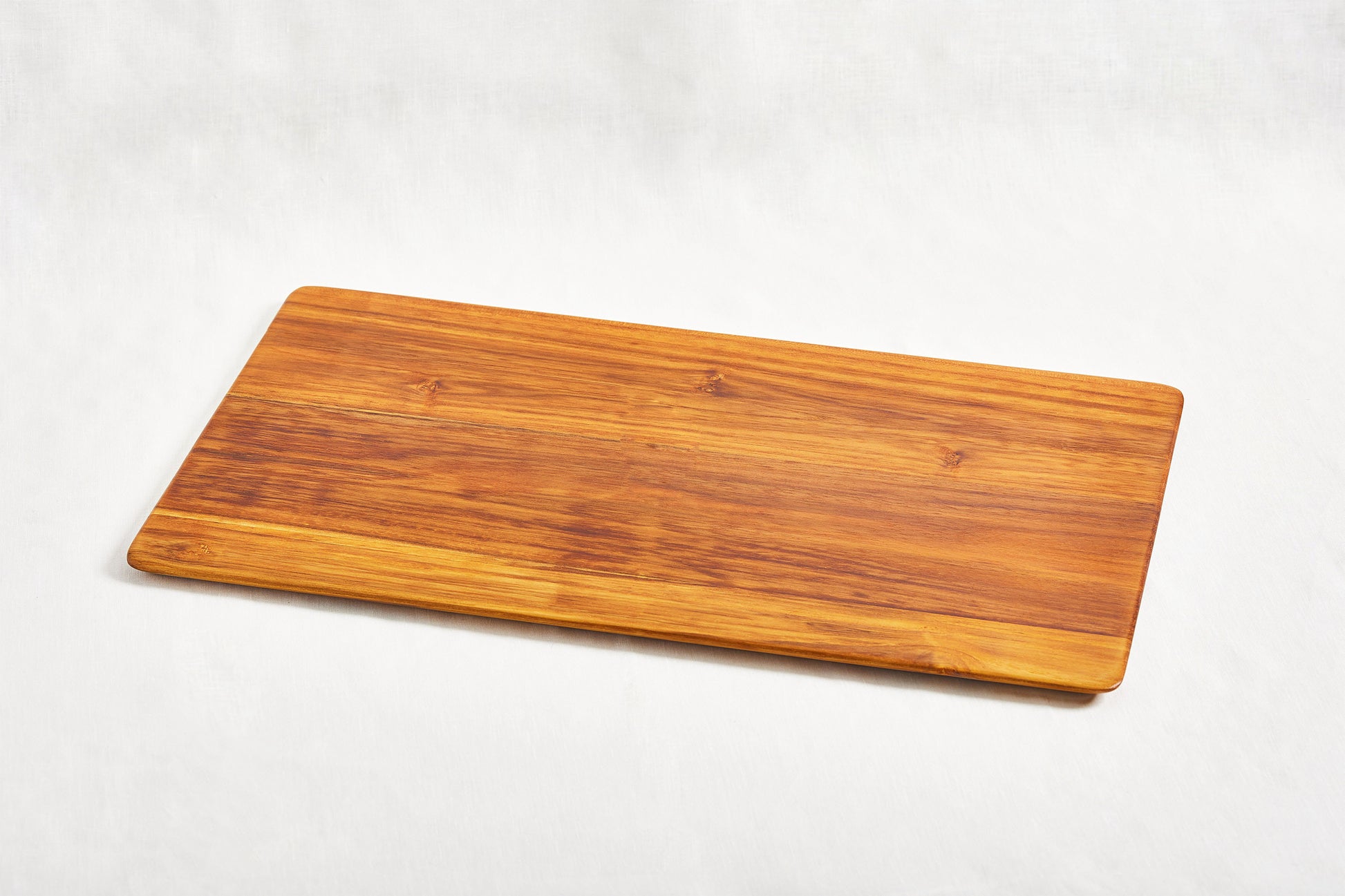 large lightweight handcarved teak cutting board