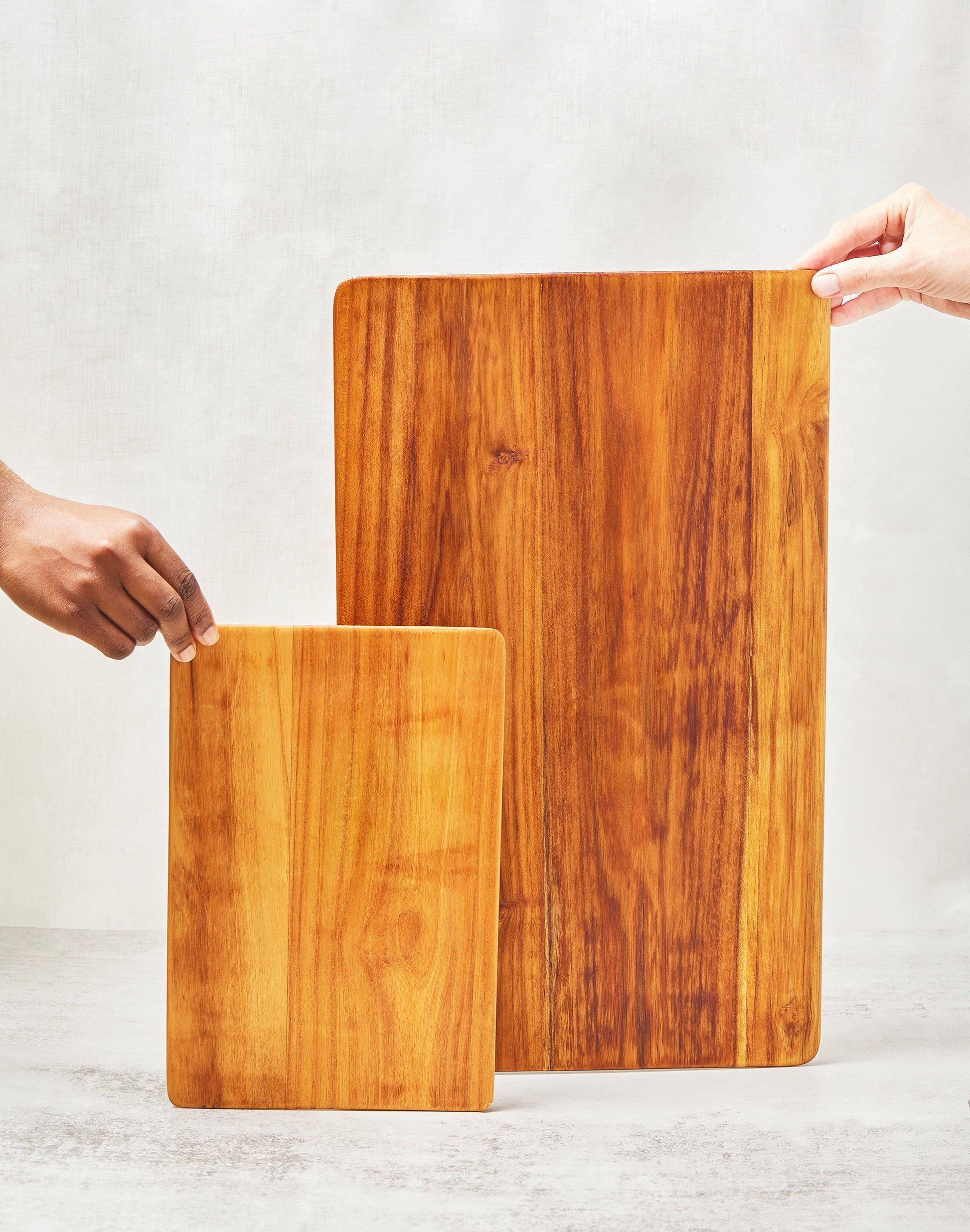 handcarved lightweight teak cutting boards in small and large